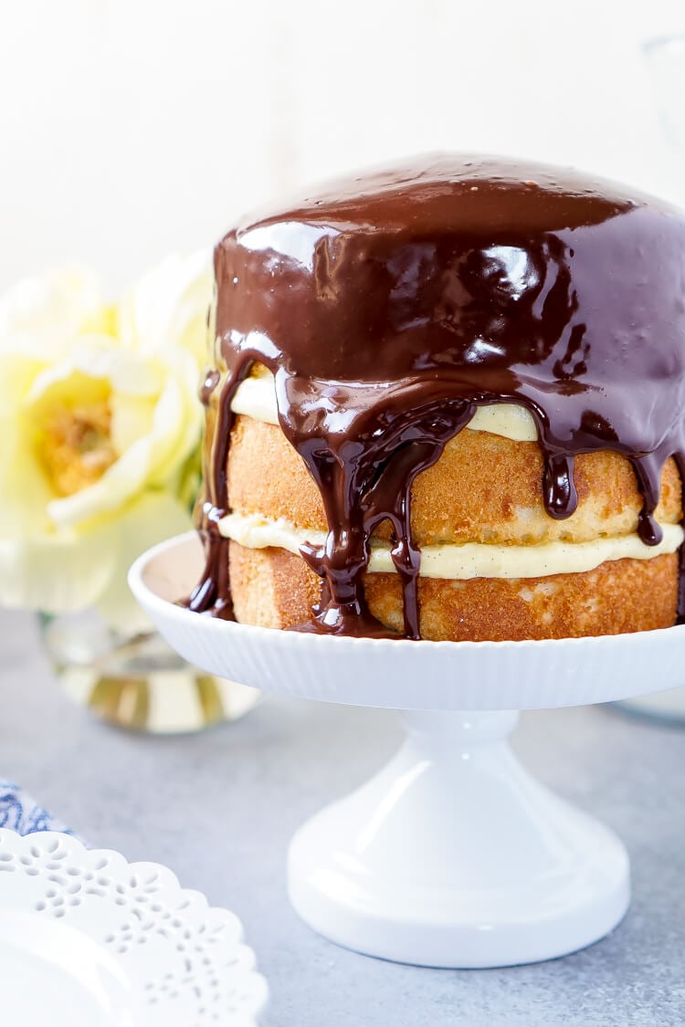This Triple Layer Boston Cream Pie is a CLASSIC if there ever was one! A delicious rum infused cake, topped with vanilla bean pastry cream and homemade chocolate ganache! A rich and wonderful New England dessert!