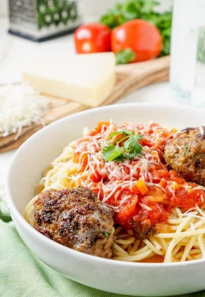 This Homemade Spaghetti and Meatballs recipe is loaded with classic Italian flavor the whole family will love!