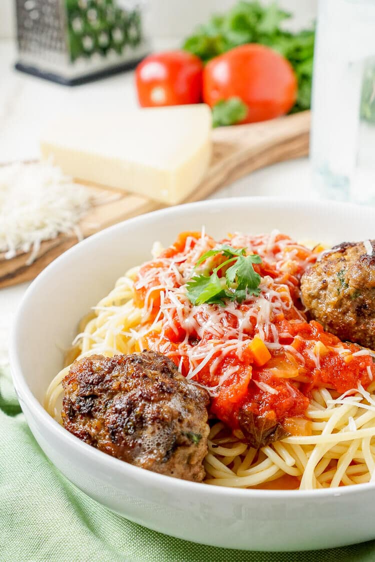This Homemade Spaghetti and Meatballs recipe is loaded with classic Italian flavor the whole family will love!