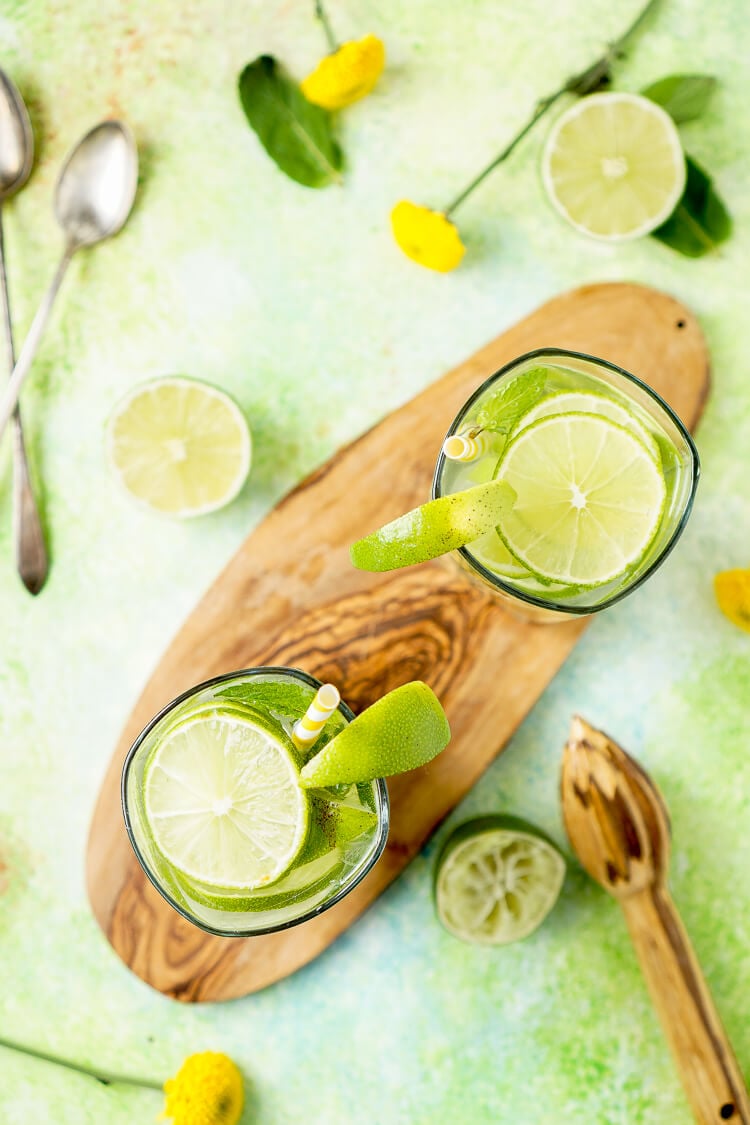 This Mojito Water is a refreshing infused water with bright limes and cool mint - make it in minutes!