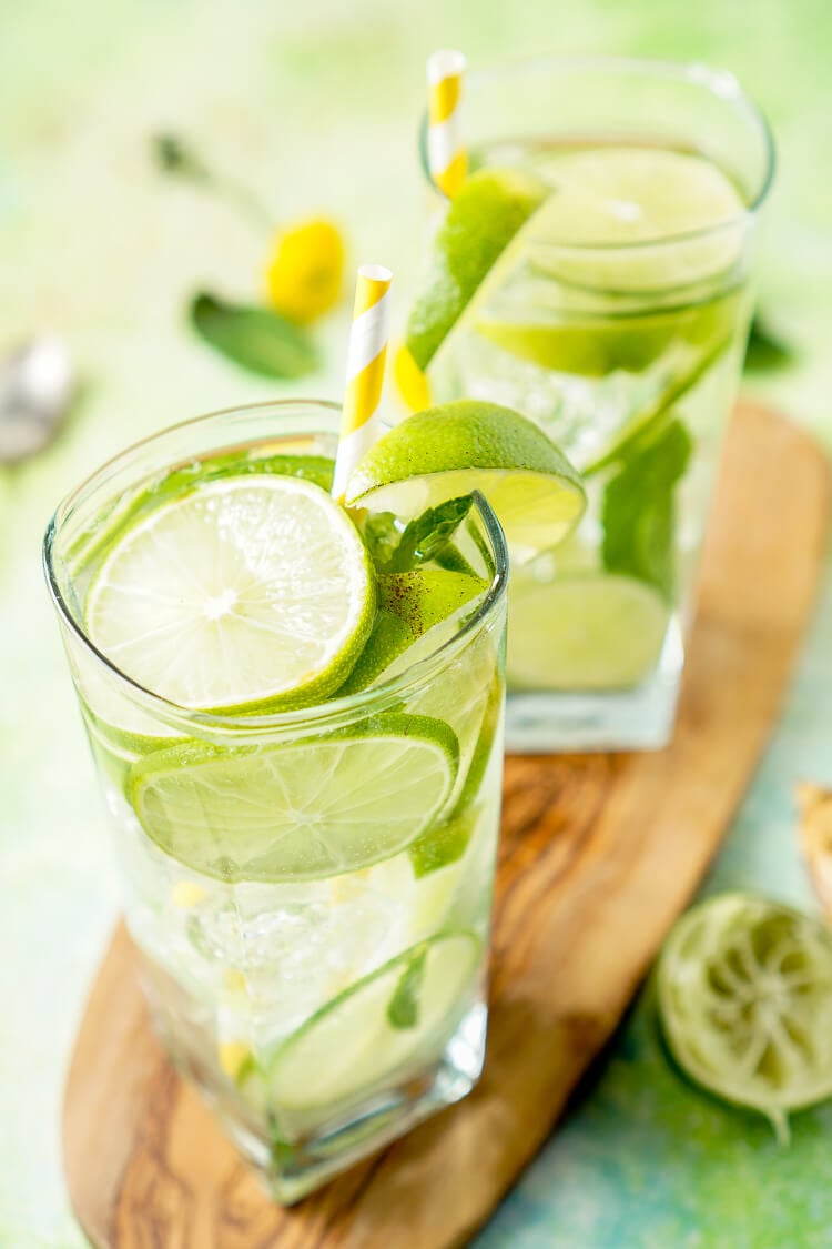 This Mojito Water is a refreshing infused water with bright limes and cool mint - make it in minutes!