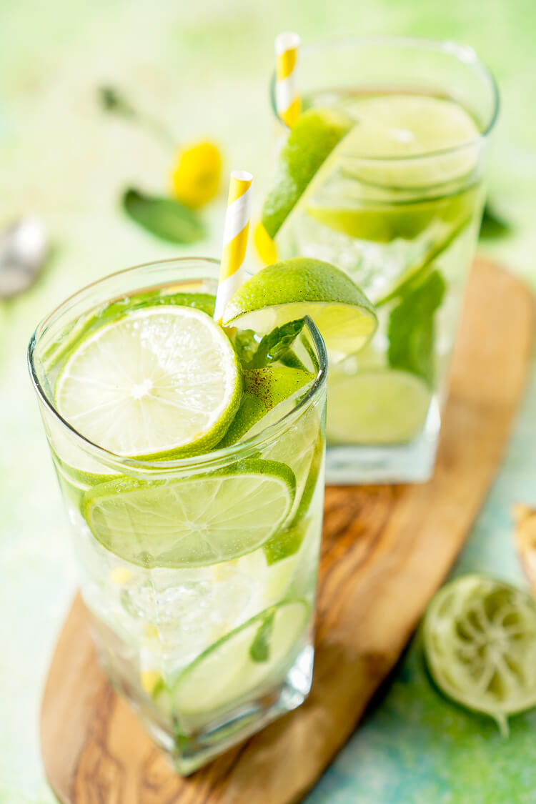 This Mojito Water is a refreshing infused water with bright limes and cool mint - make it in minutes!