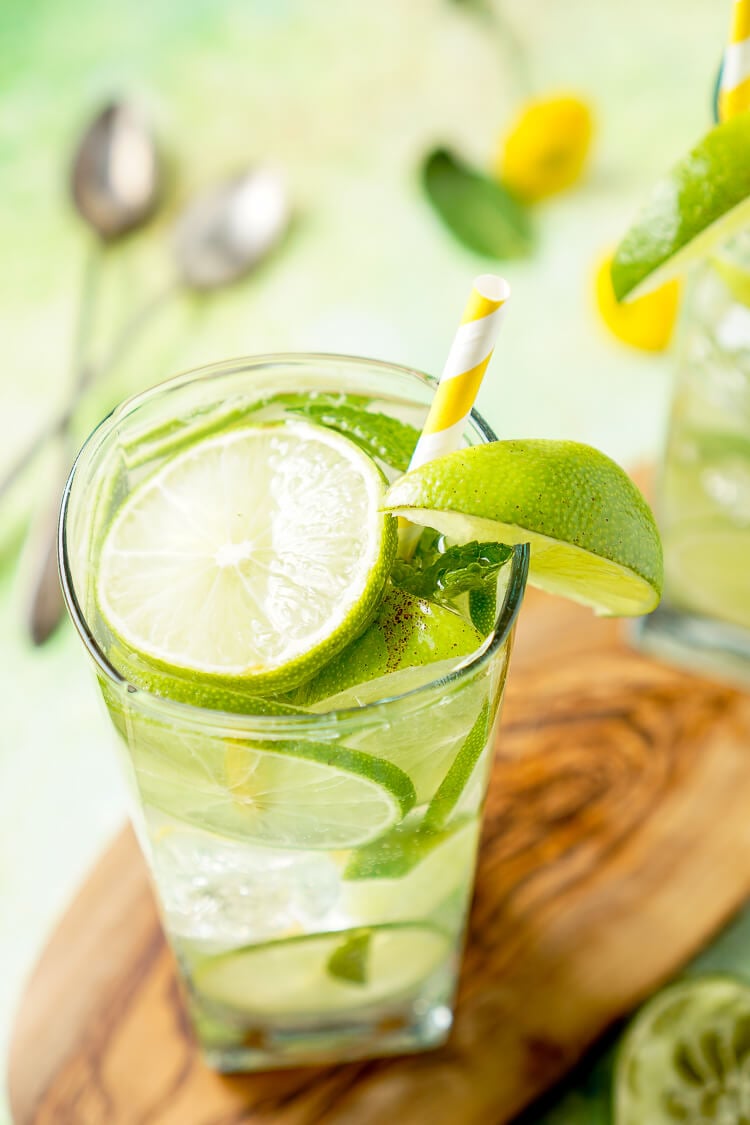 This Mojito Water is a refreshing infused water with bright limes and cool mint - make it in minutes!