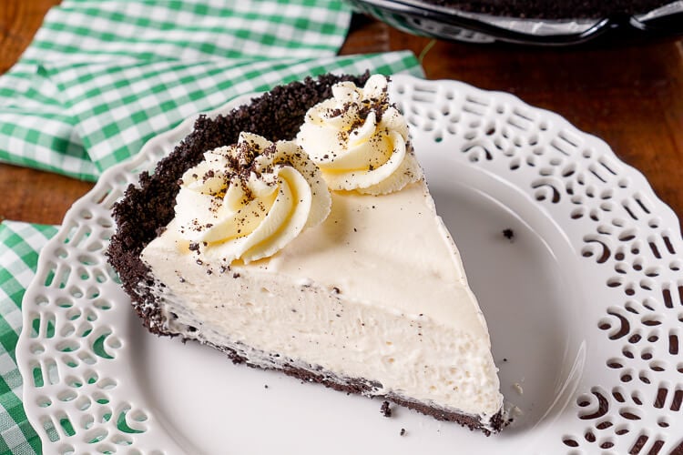 This Irish Cream Pie is an easy dessert laced with Baileys and perfect for St. Patrick's Day! A chocolate cookie crust filled with a cream marshmallow and Irish Cream filling and topped with vanilla whipped cream!