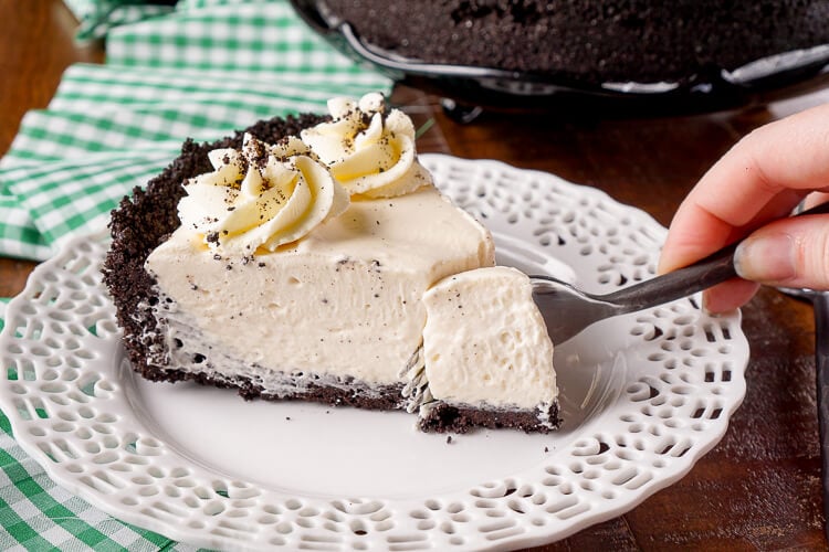 This Irish Cream Pie is an easy dessert laced with Baileys and perfect for St. Patrick's Day! A chocolate cookie crust filled with a cream marshmallow and Irish Cream filling and topped with vanilla whipped cream!