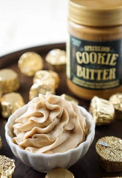 This Cookie Butter Frosting recipe is creamy and fluffy and perfect for topping cupcakes, sandwiching between cookies, or frosting cakes with!