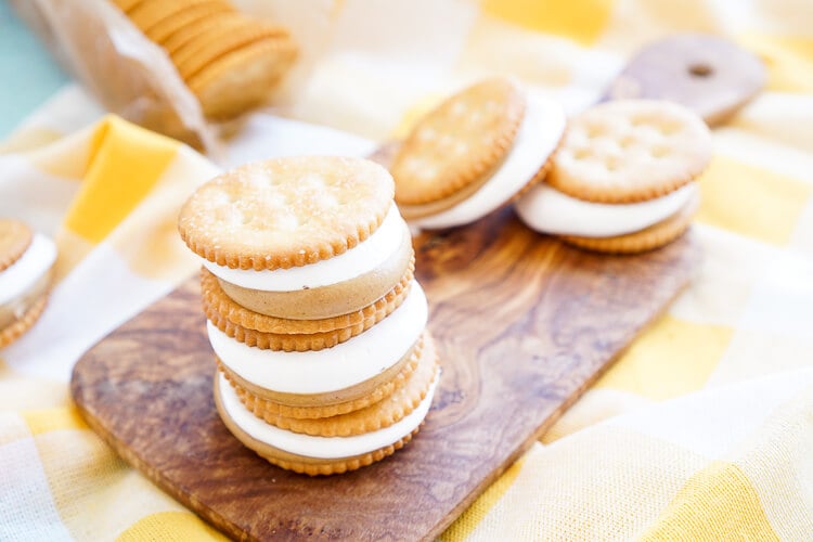 These Fluffernutter RITZwiches are a fun mix of two childhood classics! Who doesn't love peanut butter and marshmallow fluff sandwiched between two buttery RITZ crackers! It's the ultimate easy snack that's ready in just a 5 minutes! You can trade out the peanut butter for cookie butter or sun butter too!