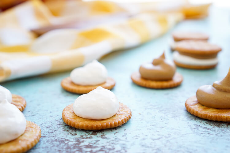 These Fluffernutter RITZwiches are a fun mix of two childhood classics! Who doesn't love peanut butter and marshmallow fluff sandwiched between two buttery RITZ crackers! It's the ultimate easy snack that's ready in just a 5 minutes! You can trade out the peanut butter for cookie butter or sun butter too!