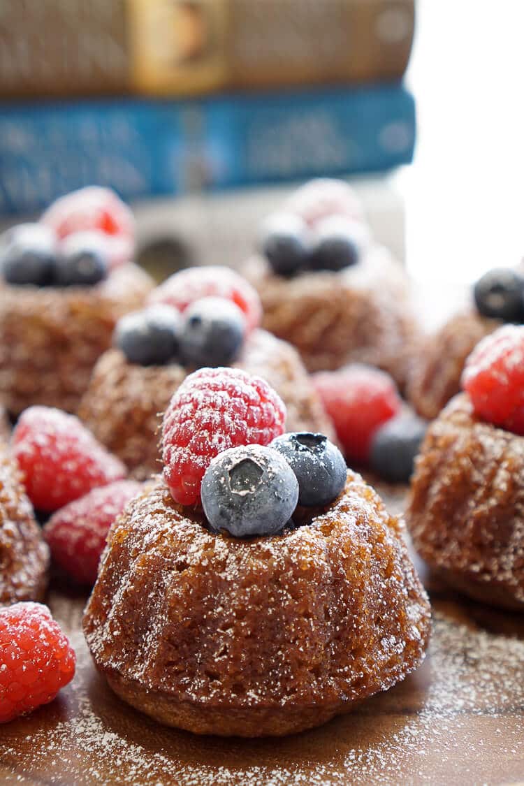 This Game of Thrones Honey Cake recipe can be made up ahead of time and is loaded with comforting flavors like honey, cinnamon, and nutmeg and laced with coffee, orange juice, and bourbon.