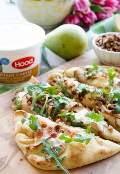 This Honey Pear Pecan Bacon Flatbread is the perfect light lunch, snack, or appetizer and just the slightest bit sweet!