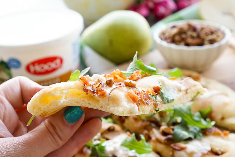 This Honey Pear Pecan Bacon Flatbread is the perfect light lunch, snack, or appetizer and just the slightest bit sweet!