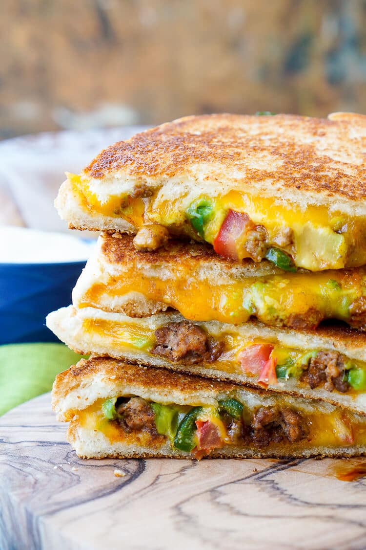 This Taco Grilled Cheese Sandwich can be customized just like a taco! The original recipe is packed with bold flavor and a little heat for a lunch or dinner that's sure to leave your mouth watering!