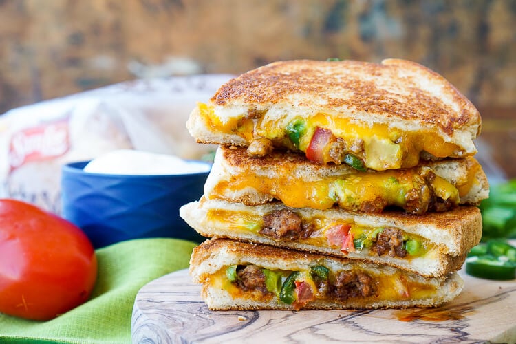 This Taco Grilled Cheese Sandwich can be customized just like a taco! The original recipe is packed with bold flavor and a little heat for a lunch or dinner that's sure to leave your mouth watering!