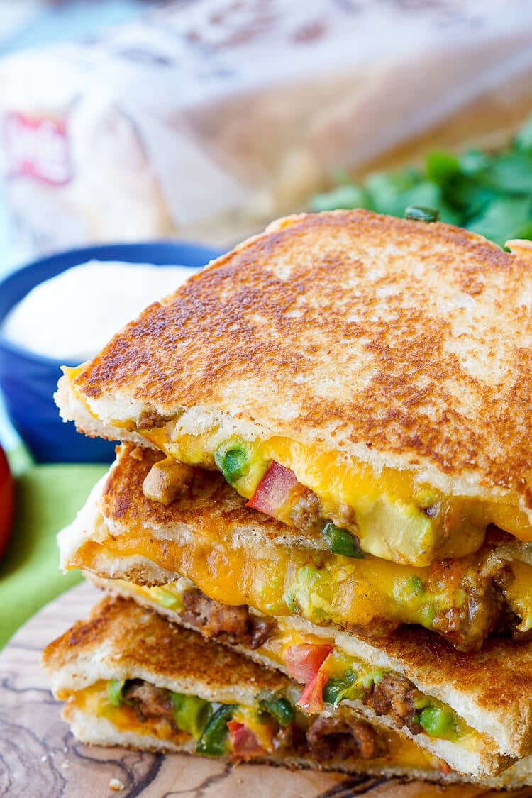 This Taco Grilled Cheese Sandwich can be customized just like a taco! The original recipe is packed with bold flavor and a little heat for a lunch or dinner that's sure to leave your mouth watering!