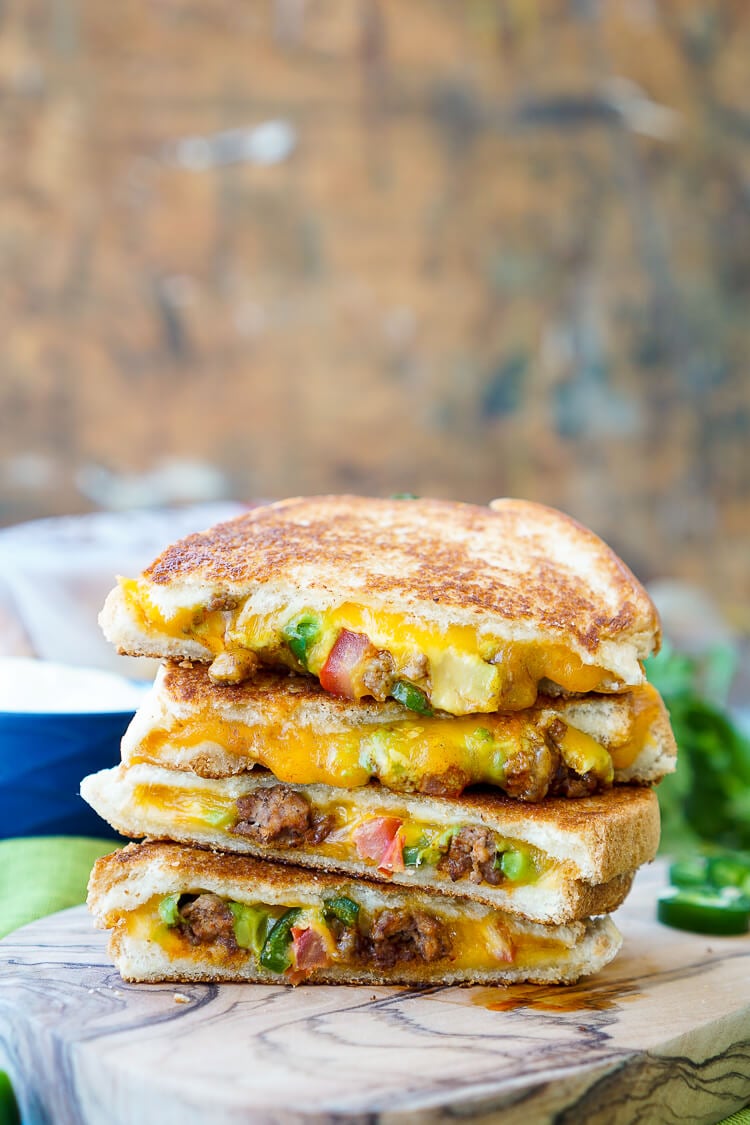 This Taco Grilled Cheese Sandwich can be customized just like a taco! The original recipe is packed with bold flavor and a little heat for a lunch or dinner that's sure to leave your mouth watering!