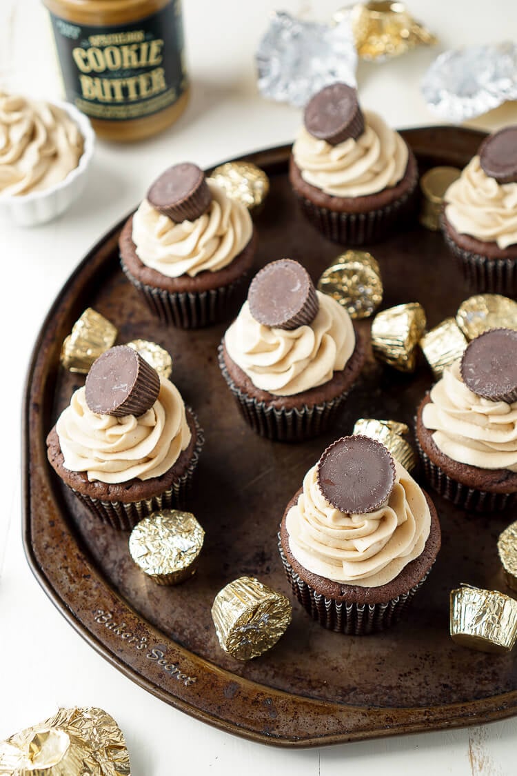 These Cookie Butter Chocolate Cupcakes are rich, sweet, and easy to make! An adapted cake box mix makes up the moist cupcakes and then they're topped with a silky smooth cookie butter frosting and a cookie butter cup!