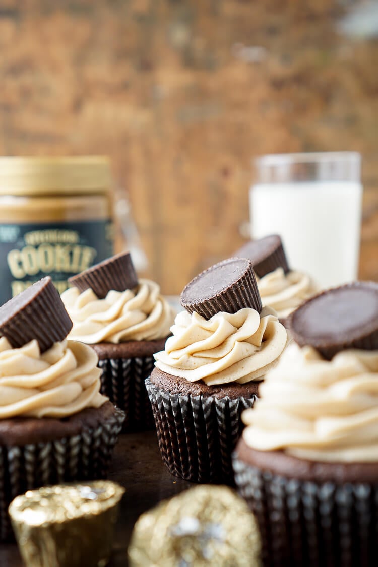 These Cookie Butter Chocolate Cupcakes are rich, sweet, and easy to make! An adapted cake box mix makes up the moist cupcakes and then they're topped with a silky smooth cookie butter frosting and a cookie butter cup!