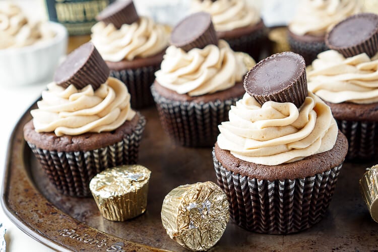 These Cookie Butter Chocolate Cupcakes are rich, sweet, and easy to make! An adapted cake box mix makes up the moist cupcakes and then they're topped with a silky smooth cookie butter frosting and a cookie butter cup!