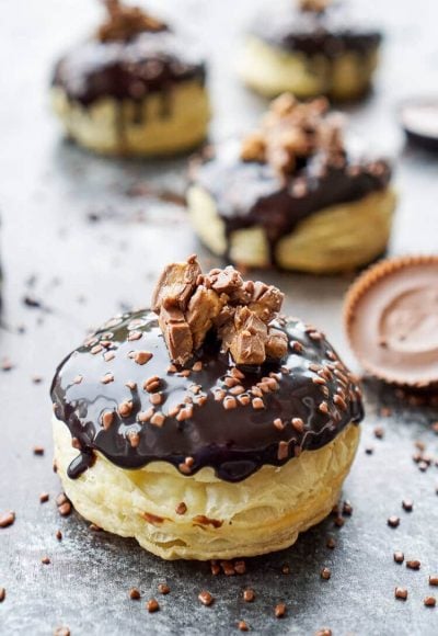 These Reese's Stuffed Puff Pastry Donuts are rich, decadent, and easy to make! Just 6 ingredients stand between you and chocolate/peanut butter bliss!