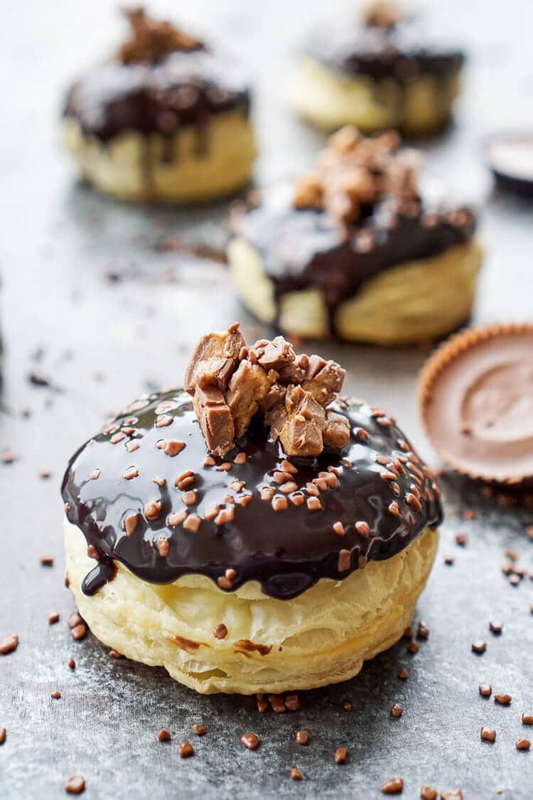 These Reese's Stuffed Puff Pastry Donuts are rich, decadent, and easy to make! Just 6 ingredients stand between you and chocolate/peanut butter bliss!