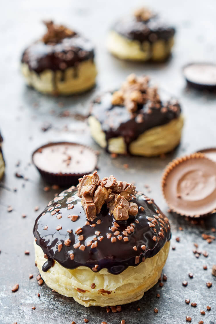 These Reese's Stuffed Puff Pastry Donuts are rich, decadent, and easy to make! Just 6 ingredients stand between you and chocolate-peanut butter bliss!