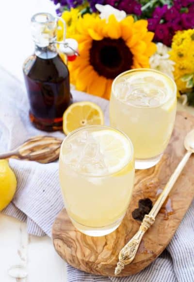 This Maple Lemonade is inspired by Maine and made with just lemon juice, maple syrup, and water. It's a refreshing cold drink for summer or fall!