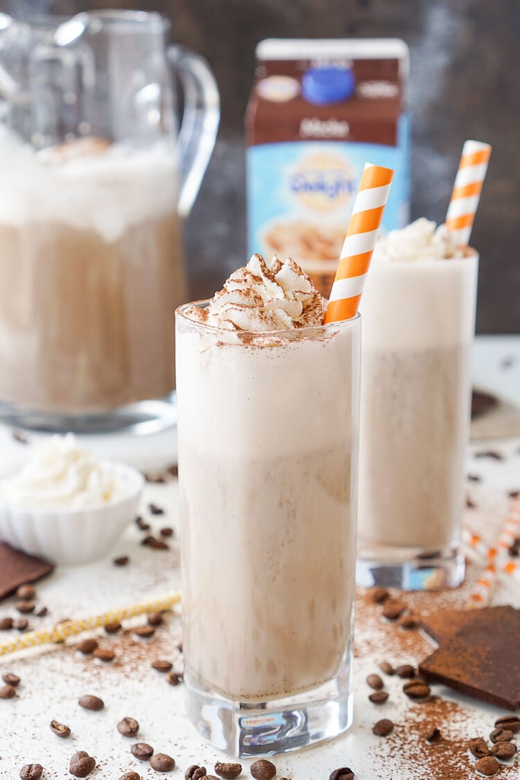 This Mocha Coffee Punch is bound to be a new party favorite by hosts and guests alike! It's easy to make and tastes amazingly creamy and delicious! Made with mocha iced coffee, sugar, milk, and vanilla ice cream, you'll love the fresh new take on the traditional party punch!