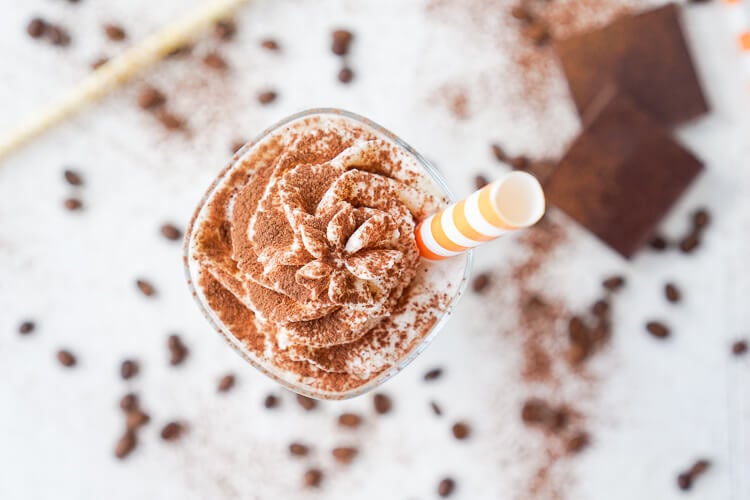 This Mocha Coffee Punch is bound to be a new party favorite by hosts and guests alike! It's easy to make and tastes amazingly creamy and delicious! Made with mocha iced coffee, sugar, milk, and vanilla ice cream, you'll love the fresh new take on the traditional party punch!