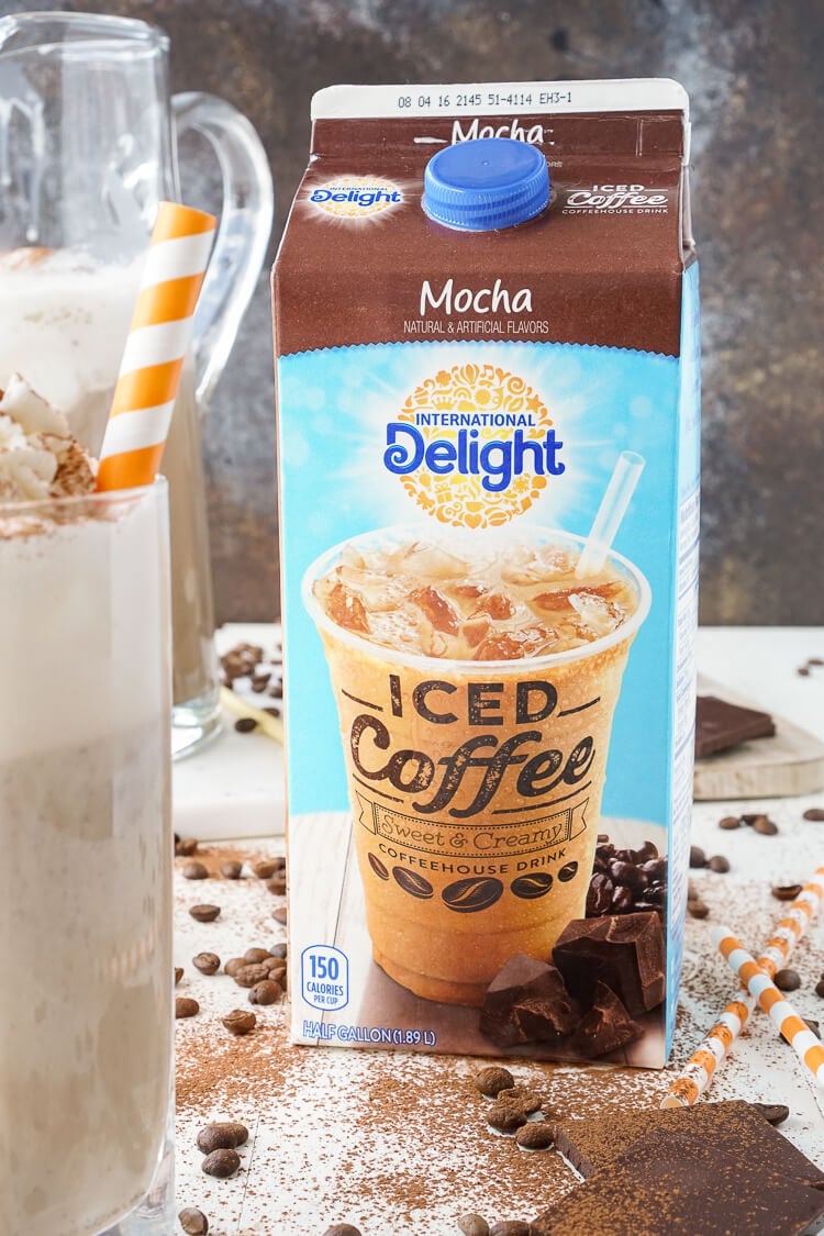 This Mocha Coffee Punch is bound to be a new party favorite by hosts and guests alike! It's easy to make and tastes amazingly creamy and delicious! Made with mocha iced coffee, sugar, milk, and vanilla ice cream, you'll love the fresh new take on the traditional party punch!