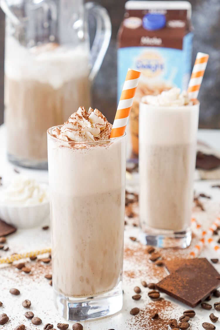 This Mocha Coffee Punch is bound to be a new party favorite by hosts and guests alike! It's easy to make and tastes amazingly creamy and delicious! Made with mocha iced coffee, sugar, milk, and vanilla ice cream, you'll love the fresh new take on the traditional party punch!