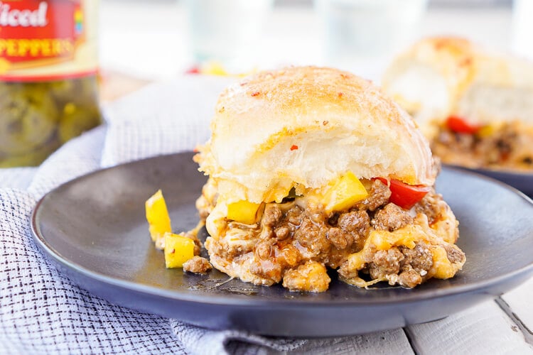 These Easy Taco Sliders are a great alternative to traditional tacos! They're simple to make and loaded with flavor, a sure crowd-pleaser and a great use for leftover taco meat too!