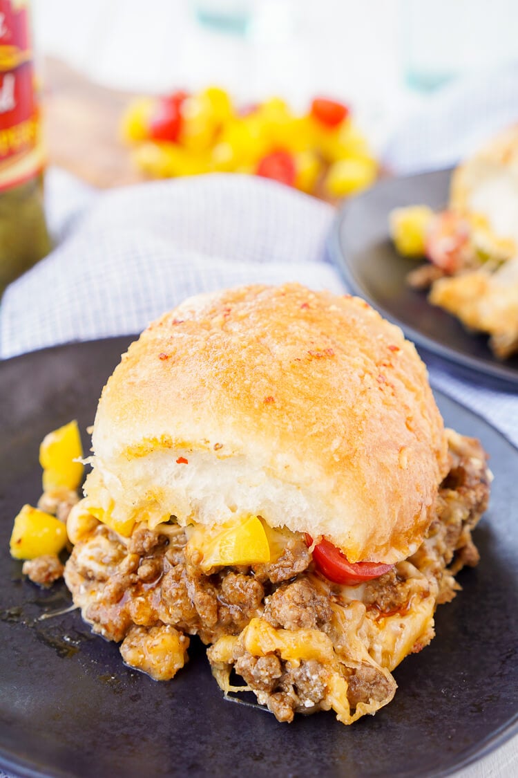 These Easy Taco Sliders are a great alternative to traditional tacos! They're simple to make and loaded with flavor, a sure crowd pleaser and a great use for leftover taco meat too!