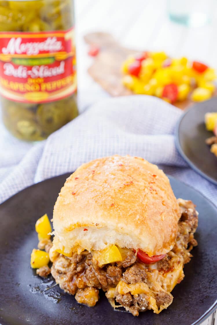 These Easy Taco Sliders are a great alternative to traditional tacos! They're simple to make and loaded with flavor, a sure crowd-pleaser and a great use for leftover taco meat too!