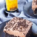 This Kahlua Chocolate Poke Cake is a deliciously boozy dessert that will get any party started! This Chocolate cake is baked with, soaked in, and frosted with Kahlua. It's the ultimate boozy dessert!