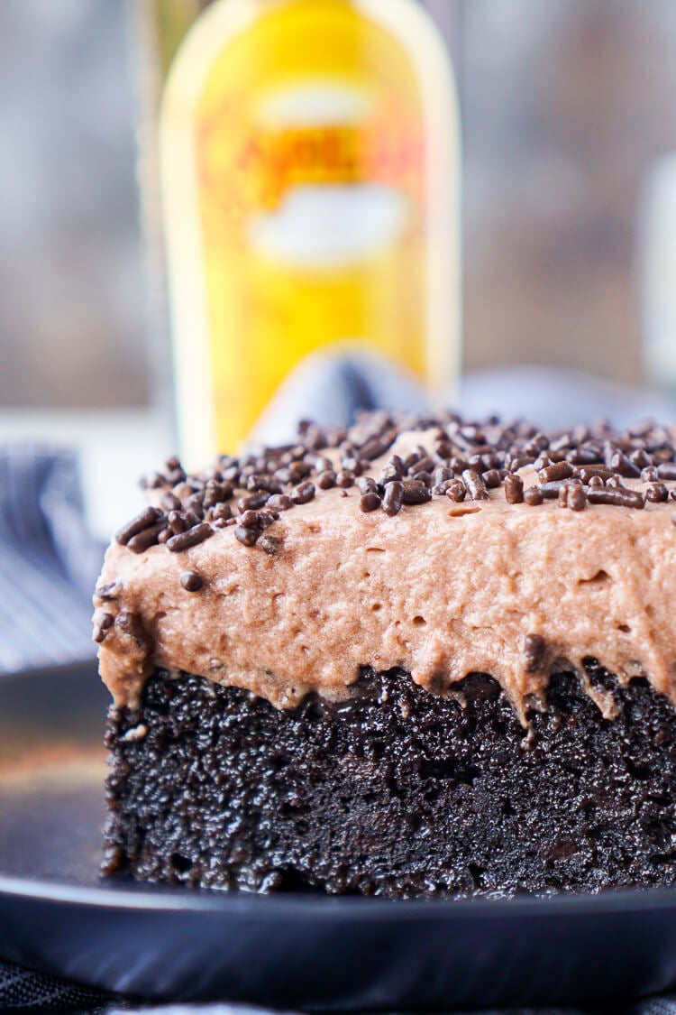 This Kahlua Chocolate Poke Cake is a deliciously boozy dessert that will get any party started!