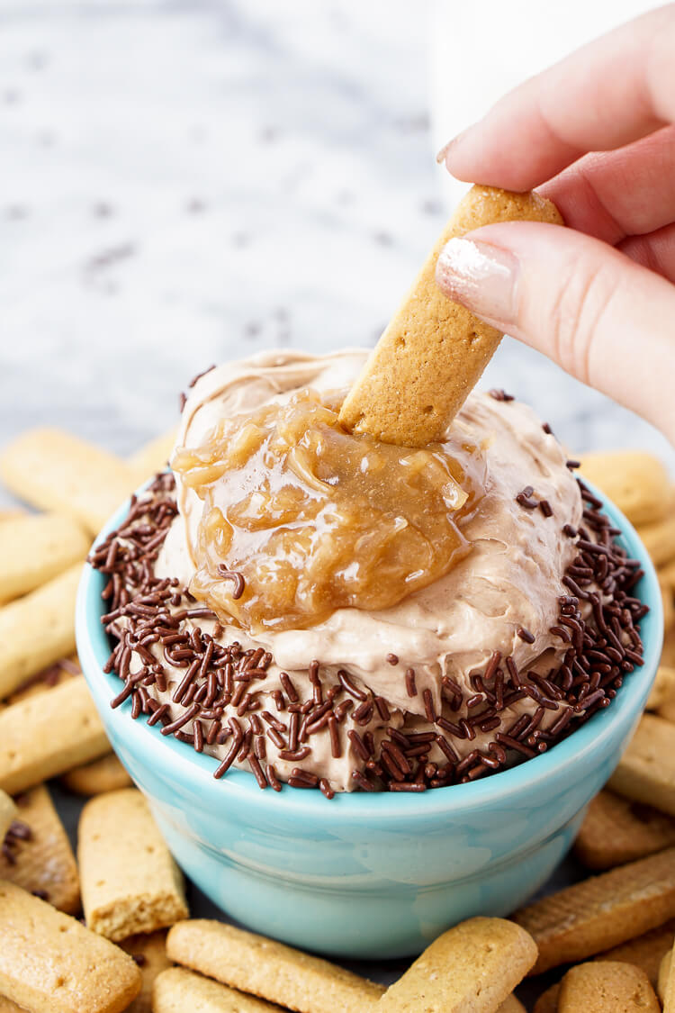 This German Chocolate Cake Batter Dip is made in less than 5 minutes with just 3 ingredients and is super addictive! You just can't beat that delicious mix of chocolate, coconut, pecans and caramel!