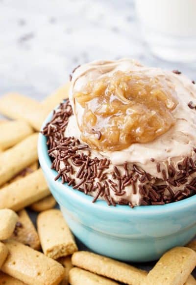 This German Chocolate Cake Batter Dip is made in less than 5 minutes with just 3 ingredients and is super addictive! You just can't beat that delicious mix of chocolate, coconut, pecans and caramel!