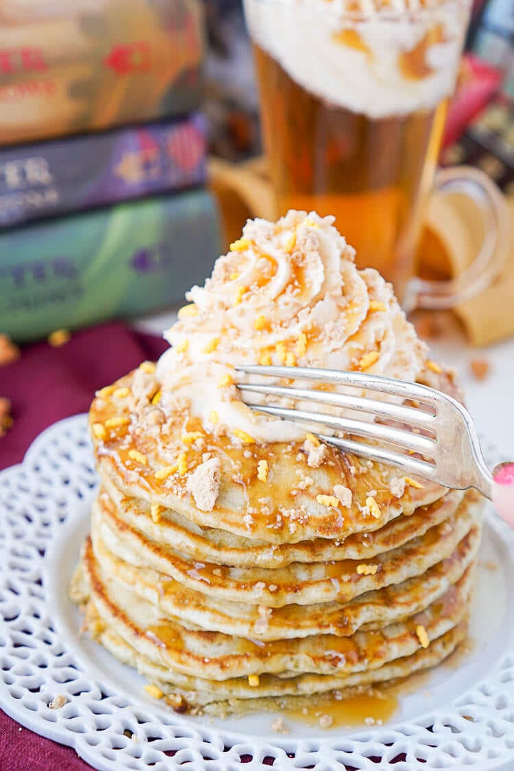 These Harry Potter Butterbeer Pancakes are loaded with caramel, butterscotch, vanilla, and butter flavor and the perfect nerdy start to your day or a great way to kick off The Chosen One’s birthday!