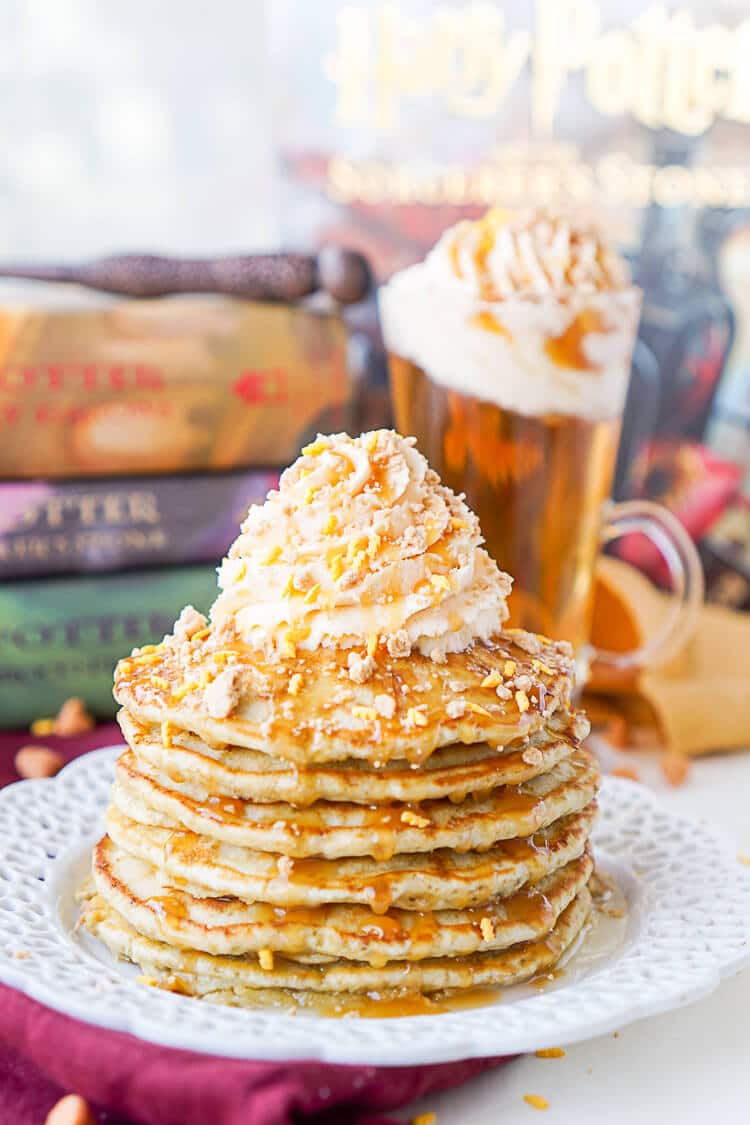 These Harry Potter Butterbeer Pancakes are loaded with caramel, butterscotch, vanilla, and butter flavor and the perfect nerdy start to your day or a great way to kick off The Chosen One’s birthday!