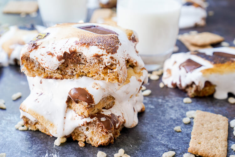 These S'mores Rice Krispies Treats are a fun way to enjoy the toasty summer dessert indoors or outdoors and all year long!