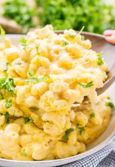 This really is the Best Ever Creamy Mac and Cheese! Made with sharp cheddar and Parmesan cheese, heavy cream and whole milk, richened with butter and kicked up with some mustard powder, you just can't go wrong! This stovetop mac and cheese recipe is on the table in just 25 minutes!