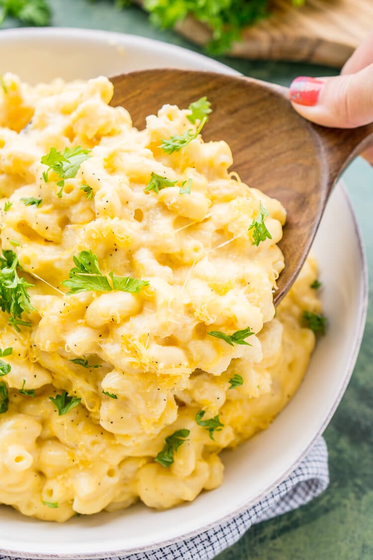 This really is the Best Ever Creamy Mac and Cheese! Made with sharp cheddar and Parmesan cheese, heavy cream and whole milk, richened with butter and kicked up with some mustard powder, you just can't go wrong! This stovetop mac and cheese recipe is on the table in just 25 minutes!
