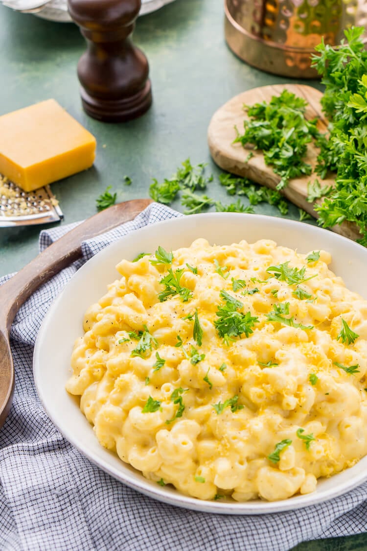 This really is the Best Ever Creamy Mac and Cheese! Made with sharp cheddar and Parmesan cheese, heavy cream and whole milk, richened with butter and kicked up with some mustard powder, you just can't go wrong! This stovetop mac and cheese recipe is on the table in just 25 minutes!