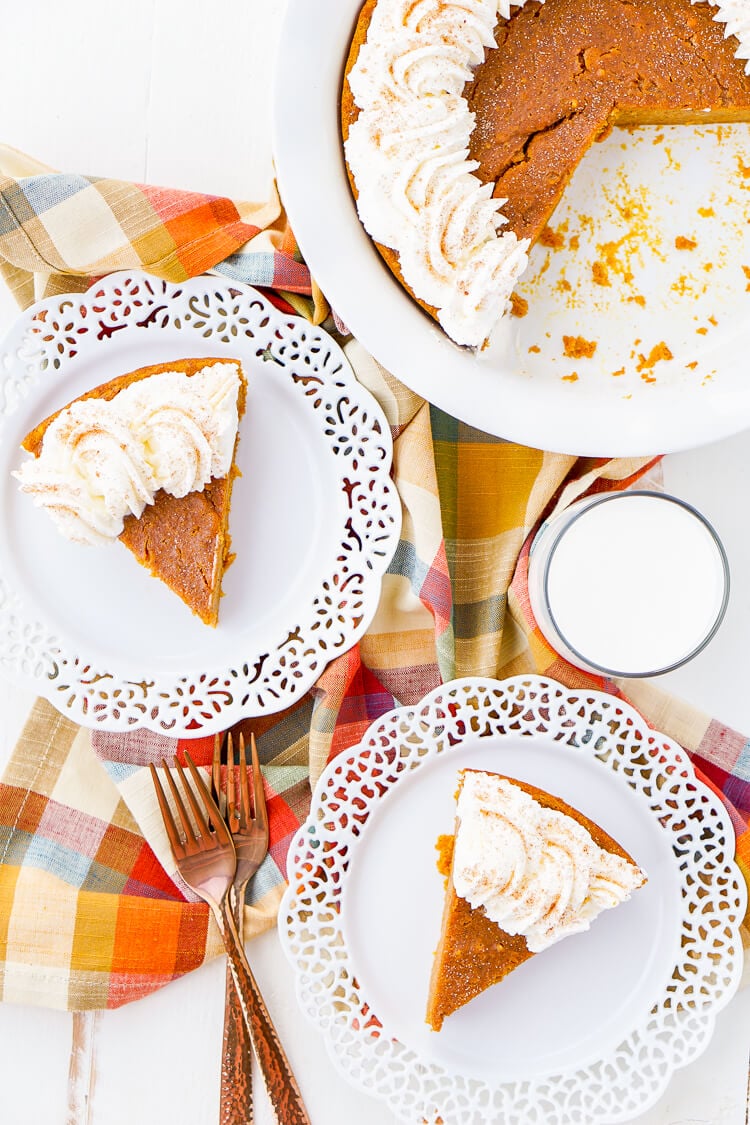 This Impossible Pumpkin Pie Recipe is actually the easiest pumpkin pie you'll ever make! As it bakes, it forms a light crust on its own and leaves behind a dense, but creamy pumpkin filling. Top it with whipped cream and it's the perfect fall dessert!