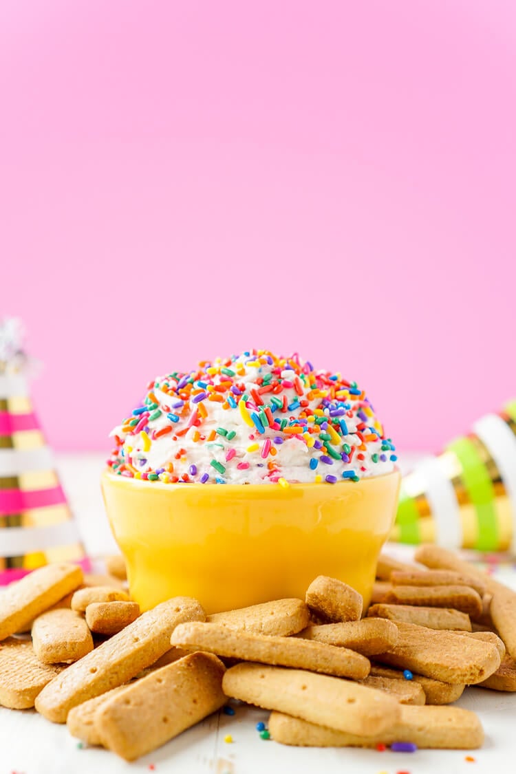 This Funfetti Birthday Cake Dip is perfect for serving up at parties or enjoying by yourself when a craving strikes! Ready in just 5 minutes and made with cake mix, cream cheese, cool whip, and rainbow sprinkles!