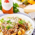 This Gnocchi Bolognese is a rich and delicious meal. A great Italian dinner option for weeknights or Sunday supper that's loaded with tender gnocchi and a hearty meat sauce laced with red wine, onions, and garlic.