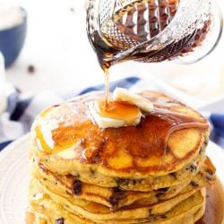 These Pumpkin Chocolate Chip Pancakes taste just like the classic fall cookie, except in this case you can drench them in maple syrup, smother them in butter, and eat them for breakfast!