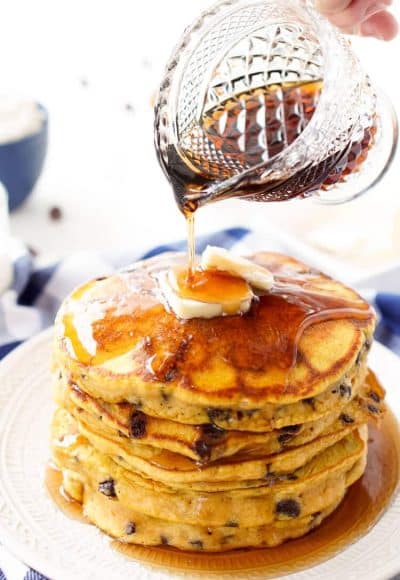 These Pumpkin Chocolate Chip Pancakes taste just like the classic fall cookie, except in this case you can drench them in maple syrup, smother them in butter, and eat them for breakfast!