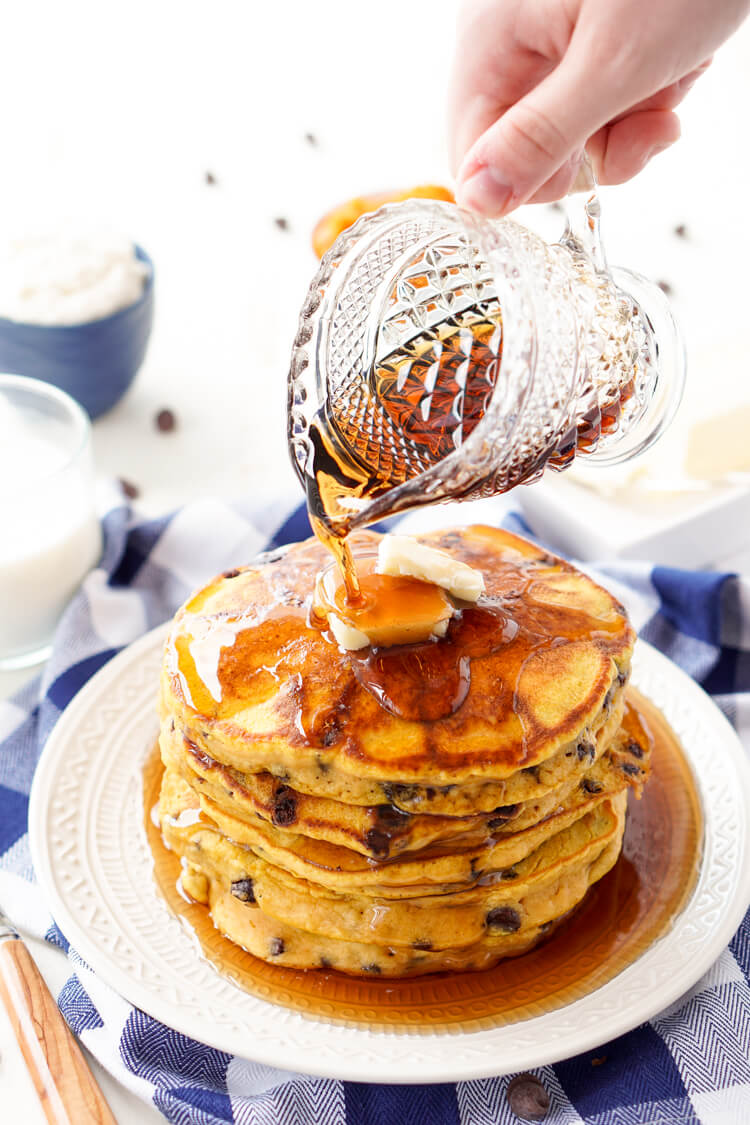 These Pumpkin Chocolate Chip Pancakes taste just like the classic fall cookie, except in this case you can drench them in maple syrup, smother them in butter, and eat them for breakfast!