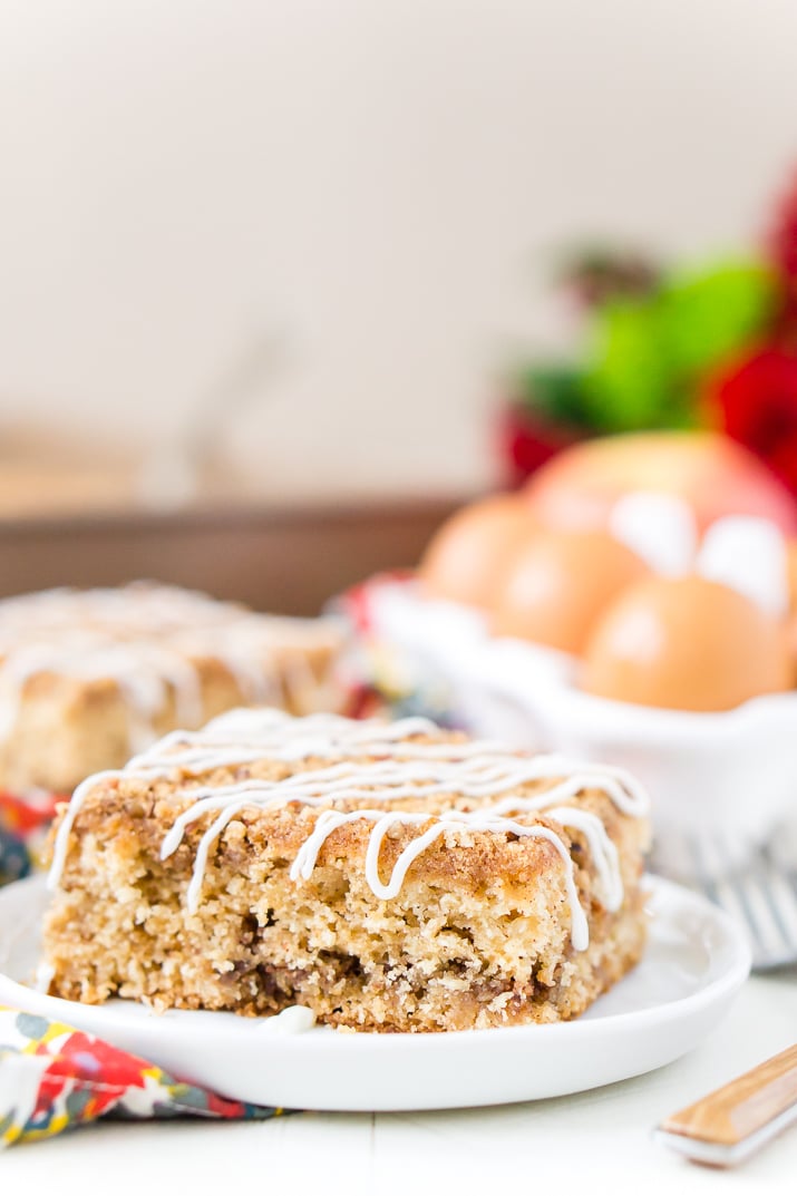 This Old Fashioned Apple Cake is made with warm spices, oatmeal, and apple jelly for a simple and delicious fall dessert!